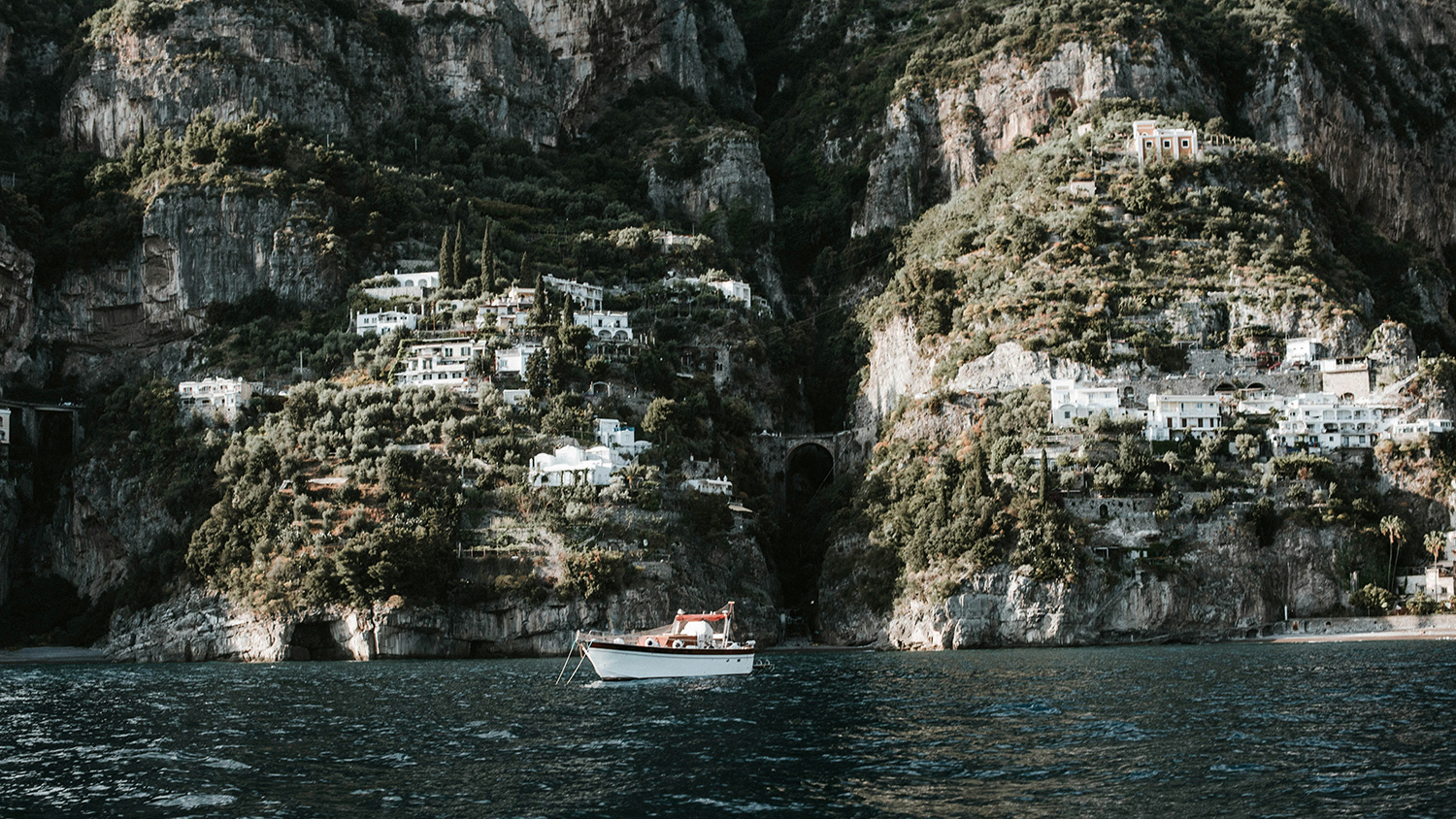Praiano village built into steep cliffs above the sea on the Amalfi Coast
