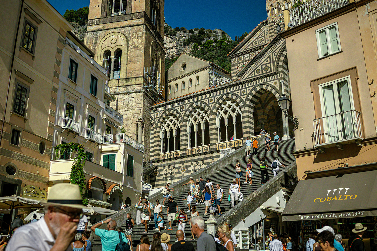 Amalfi Cathedral and its grand staircase in Piazza Duomo on the Amalfi Coast.