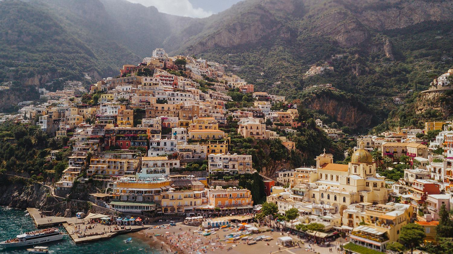 Positano on the Amalfi Coast with Spiaggia Grande and hillside houses.