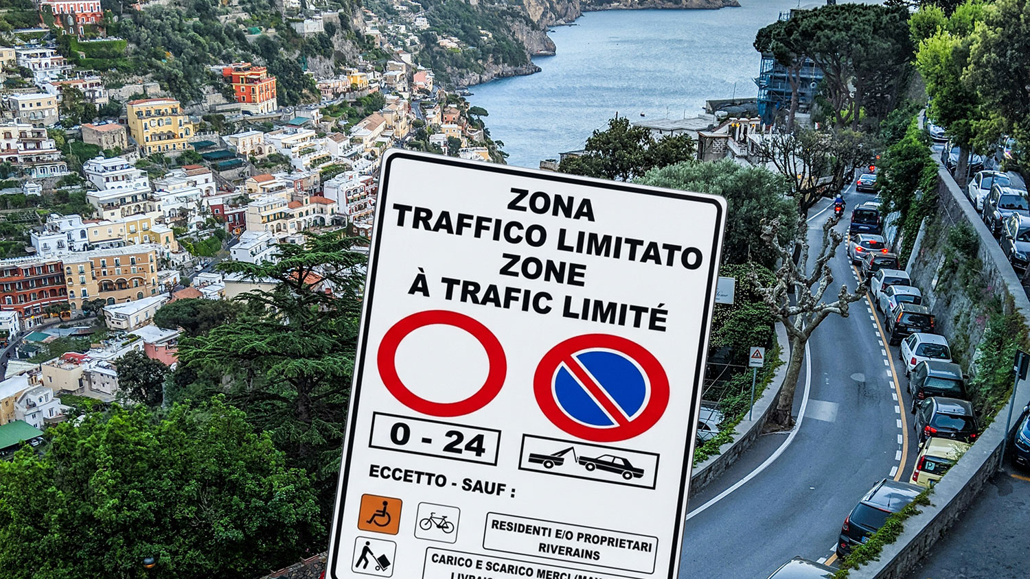 ZTL traffic sign beside a winding road in Positano, Italy